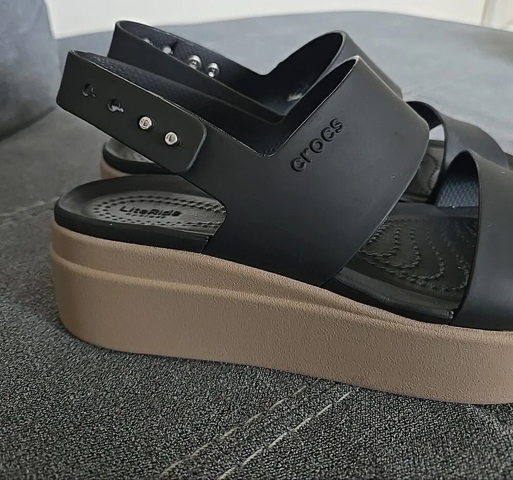 Crocs Brooklyn Low Wedge Sandal In Black And Tan